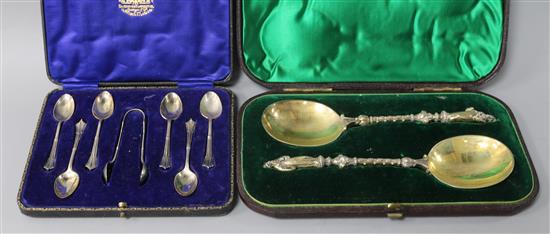 A pair of Victorian silver-gilt apostle serving spoons and a set of six silver coffee spoons and sugar tongs, approx 7.6oz gross